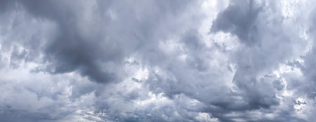 Sky and dark cloud. Gray texture for wide banner.の写真素材