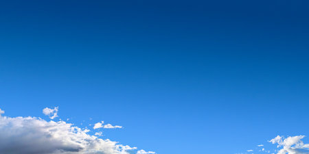 Cloud long wide space copy on Blue Sky above Sunny Day. A translucent, dissolving sheet of lace, vapor from a cloud, floating into distance. Nature Scenery Good Weather. Banner super panoramic Screen.の写真素材