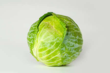 Green cabbage isolated on white backgroundの写真素材