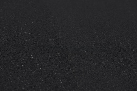 Freshly laid black asphalt on the street.. Background, copy space.の写真素材