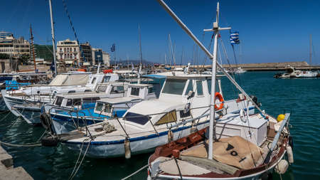 Heraklion - Greece - 28 - July - 2020: Fishing boats on the sea in the portのeditorial素材