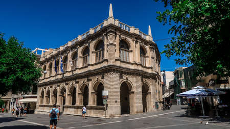 Heraklion - Greece - 28 - July - 2020: City hall with a few tourists aroundのeditorial素材
