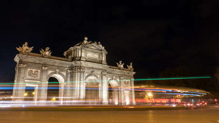 Puerta de Alcala (Alcala Gate) during night in Madrid, Spainの写真素材