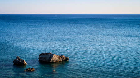 Rocks in the sea. Show of rocks. Calm blue seaの写真素材
