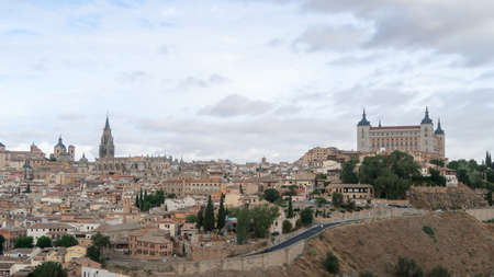 Mesmerizing shot of a beautiful cityscape and ancient castle of Toledo in Spainのeditorial素材