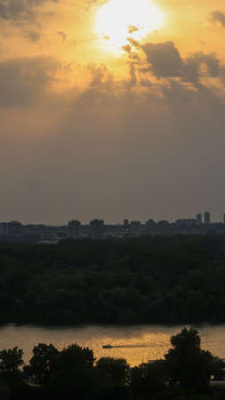 View of beautiful sunset over Zemun, Big War Island and confluense of rivers Danube and Sava, viewed from Kalemegdan fortress in Belgrade, Serbiaの写真素材