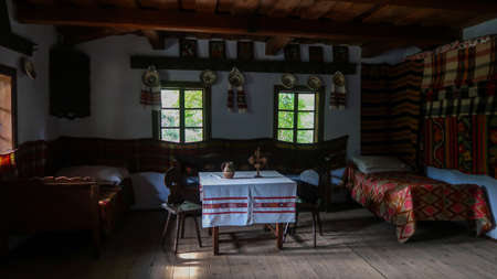 Bucharest, Romania, 10th of August 2021 - Old traditional house in the National Village Museumのeditorial素材