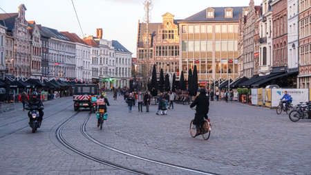 Gent, Belgium, 8th of November 2021 - Activity of people in the city center. People with bikes in the cityのeditorial素材