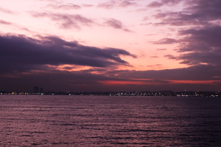 Landscape of Bosphorus and Istabul at night during sunset with cloudsの写真素材