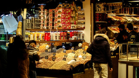 Istanbul, Turkey, 31st of December 2021 - People shopping during the night in the marketplace