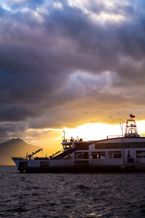 Ship on the Aegean Sea during sunset on the coast of Izmir with copy spaceの写真素材