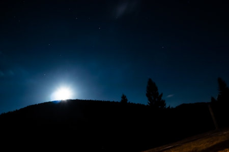 Mountain landscape during the night with stars and clear sky