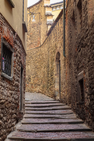 Paved road with appartment buildings and architecture in Bergamo, Italyの写真素材