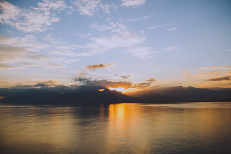 Landscape of the Mediterranean sea with mountains in the distance during the sunset, Antalya, Turkeyの写真素材