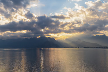 Landscape of Mediterranean sea with mountains in the distance during the sunset, Antalya, Turkeyの写真素材