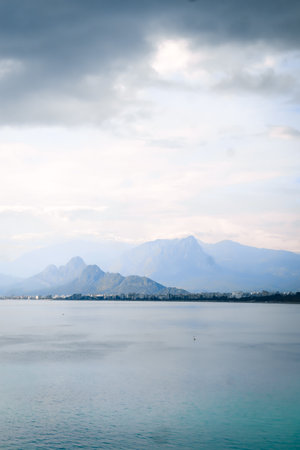Mediterranean Sea and mountains peak in the distance seen from Antalya coast, Turkeyの写真素材