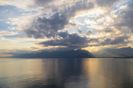 Landscape of Mediterranean sea with mountains in the distance during the sunset, Antalya, Turkeyの写真素材
