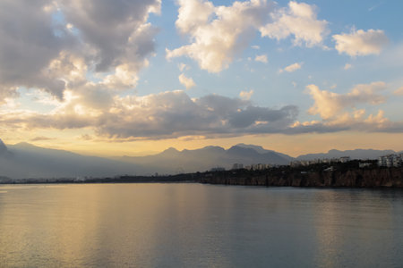 Landscape of Mediterranean sea with mountains in the distance during the sunset, Antalya, Turkeyの写真素材