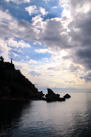 Backlit rocks and cliff during a sunny day in Antalya, Turkeyの写真素材