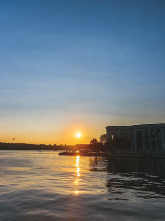View of Bosphorus and Istanbul city during the sunset with the sun reflecting in the waterの写真素材