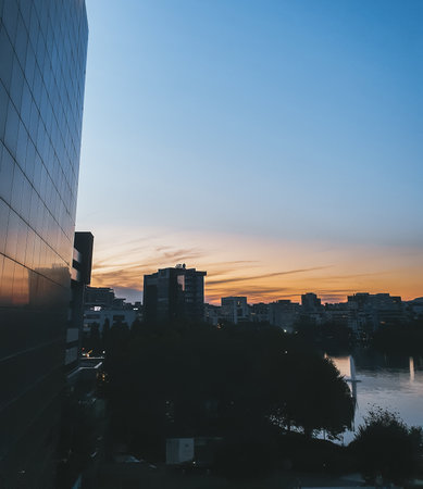 CItyscape view during sunset and with clear sky of Cluj-Napoca, Romaniaの写真素材