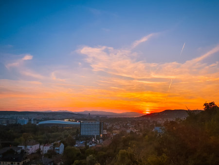 CItyscape view during sunset and with clear sky of Cluj-Napoca, Romania. Landscape view of city