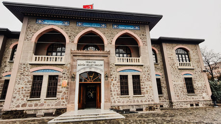 Exterior view of the historic First Turkish Grand National Assembly building with arched balconies in Ankara Turkeyの写真素材