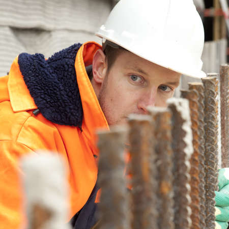 Manual worker looking at construction, road constructionの写真素材
