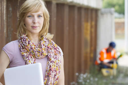 Casual businesswoman with laptop