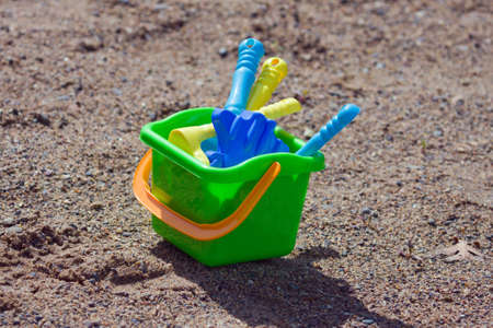 A set of kids sand tools on the beach.の写真素材