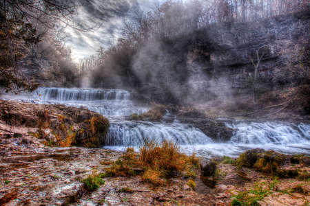 Colorful scenic river and powerful waterfall in HDRの写真素材
