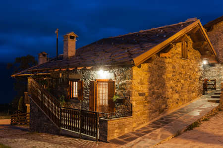 Typical village house in the province of Aosta Valley in Italy photographed at nightのeditorial素材