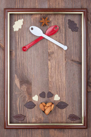 Culinary frame as the coat of arms on a wooden backgroundの写真素材