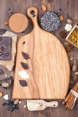 Kitchen board with prepared ingredients for bakingの写真素材