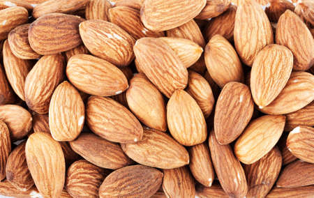 Pile of almonds closeup as backgroundの写真素材