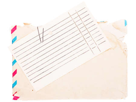 Envelope with a sheet of paper isolated on white backgroundの写真素材