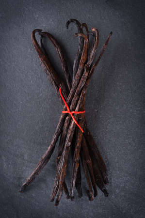 Vanilla pods tied with red ropeの写真素材