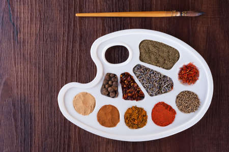 Palette of colors of herbs and spicesの写真素材