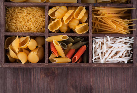 Italian pasta collection in wooden boxの写真素材