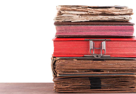 Stack of old books isolated on whiteの写真素材