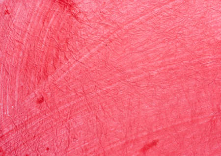 Background textured red handmade paperの写真素材