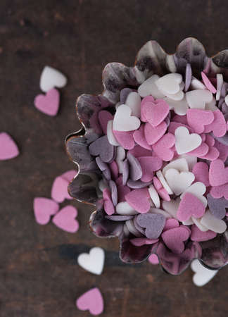 Sugar hearts to decorate pastries in a cookies formの写真素材