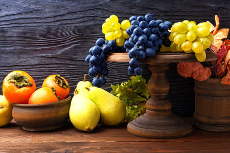 Still life with autumn fruits in a rustic style with copy spaceの写真素材