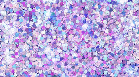 Real shiny heart-shaped sparkles textured backgroundの写真素材