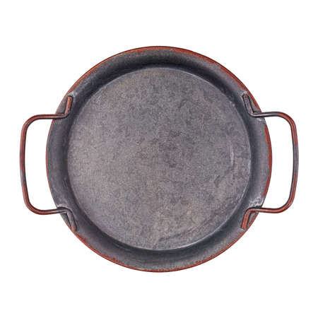 Rusty empty round metal tray with handles top view isolatedの写真素材