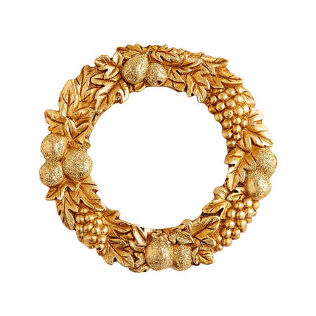 Round empty decorative golden color frame in the form of a wreath with fruits and leaves isolatedの写真素材