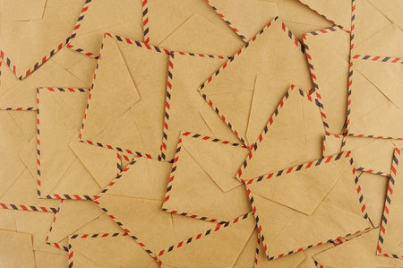 Background from a large number of postal envelopes, top view closeupの写真素材