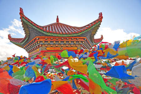 Tibet Pavilion and aflutter buddhist praying flagの写真素材