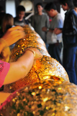NAN THAILAND - JAN 1  Unidentified people was gild on buddhism  holy monastery stone on  January 1, 2010 at  Wat of Muang, Nan, Thailandのeditorial素材