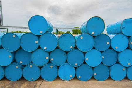 oil barrels or chemical drums stacked upの写真素材